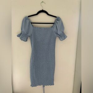 Love Tree mini smocked dress in light blue with puff sleeves